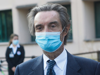 The President of Lombardy Region Attilio Fontana speaks to journalists during the visit to the Lagrange Institute in Milan during the reopen...