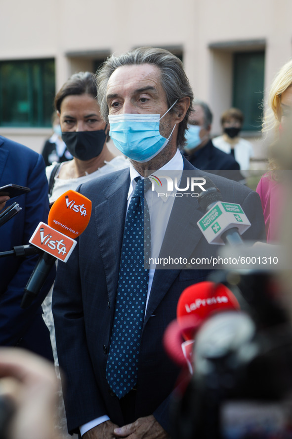 The President of Lombardy Region Attilio Fontana speaks to journalists during the visit to the Lagrange Institute in Milan during the reopen...