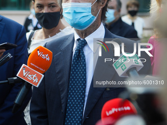 The President of Lombardy Region Attilio Fontana speaks to journalists during the visit to the Lagrange Institute in Milan during the reopen...