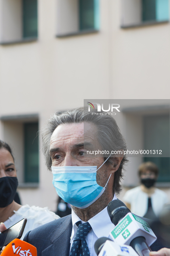 The President of Lombardy Region Attilio Fontana speaks to journalists during the visit to the Lagrange Institute in Milan during the reopen...