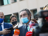 The President of Lombardy Region Attilio Fontana speaks to journalists during the visit to the Lagrange Institute in Milan during the reopen...