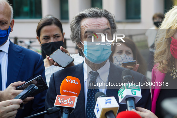 The President of Lombardy Region Attilio Fontana speaks to journalists during the visit to the Lagrange Institute in Milan during the reopen...