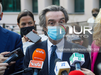 The President of Lombardy Region Attilio Fontana speaks to journalists during the visit to the Lagrange Institute in Milan during the reopen...