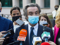 The President of Lombardy Region Attilio Fontana speaks to journalists during the visit to the Lagrange Institute in Milan during the reopen...