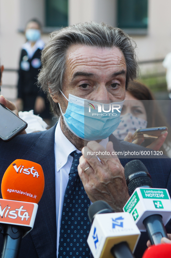 The President of Lombardy Region Attilio Fontana speaks to journalists during the visit to the Lagrange Institute in Milan during the reopen...