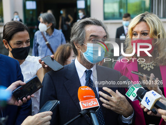 The President of Lombardy Region Attilio Fontana speaks to journalists during the visit to the Lagrange Institute in Milan during the reopen...