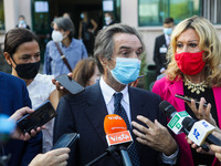 The President of Lombardy Region Attilio Fontana speaks to journalists during the visit to the Lagrange Institute in Milan during the reopen...