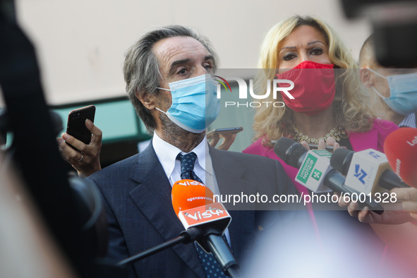 The President of Lombardy Region Attilio Fontana speaks to journalists during the visit to the Lagrange Institute in Milan during the reopen...