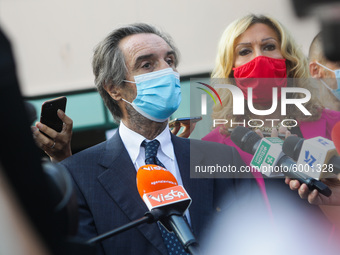 The President of Lombardy Region Attilio Fontana speaks to journalists during the visit to the Lagrange Institute in Milan during the reopen...