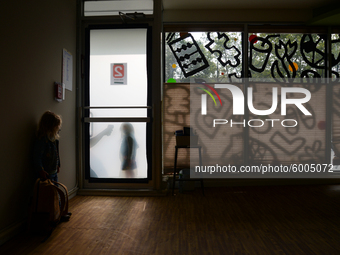 Students return for their first day of in-class schooling following the pandemic at New York City's Preschool of the Arts, having their temp...