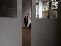 Students return for their first day of in-class schooling following the pandemic at New York City's Preschool of the Arts, having their temp...