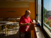 A janitor cleaning and disinfecting desks and the classroom in the Don Tonino Bello High School in Molfetta on 16th September 2020.
The reo...