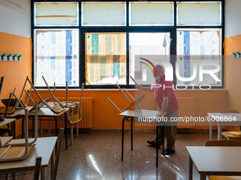 A janitor preparing the classroom with the spacing of the desks in the Don Tonino Bello High School in Molfetta on 16th September 2020.
The...