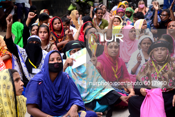 Garments workers of Dragon Group stage a demonstration in front of Department of Labor building demanding their due payment in Dhaka, Bangla...