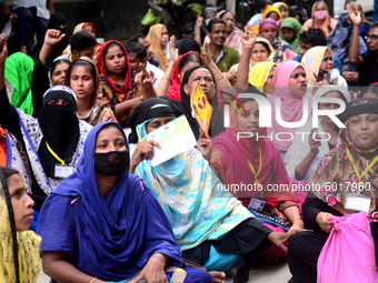 Garments workers of Dragon Group stage a demonstration in front of Department of Labor building demanding their due payment in Dhaka, Bangla...