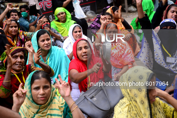 Garments workers of Dragon Group stage a demonstration in front of Department of Labor building demanding their due payment in Dhaka, Bangla...