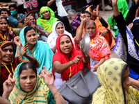 Garments workers of Dragon Group stage a demonstration in front of Department of Labor building demanding their due payment in Dhaka, Bangla...