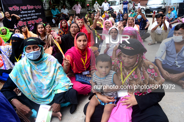 Garments workers of Dragon Group stage a demonstration in front of Department of Labor building demanding their due payment in Dhaka, Bangla...