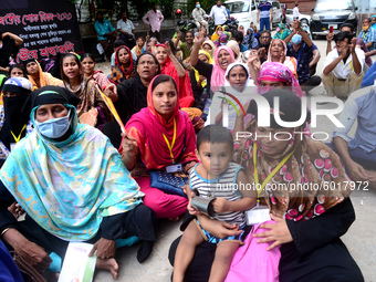 Garments workers of Dragon Group stage a demonstration in front of Department of Labor building demanding their due payment in Dhaka, Bangla...