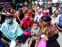 Garments workers of Dragon Group stage a demonstration in front of Department of Labor building demanding their due payment in Dhaka, Bangla...