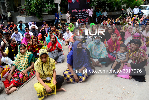 Garments workers of Dragon Group stage a demonstration in front of Department of Labor building demanding their due payment in Dhaka, Bangla...