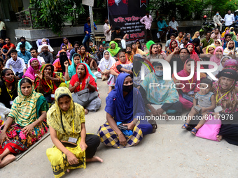 Garments workers of Dragon Group stage a demonstration in front of Department of Labor building demanding their due payment in Dhaka, Bangla...