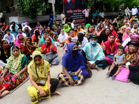 Garments workers of Dragon Group stage a demonstration in front of Department of Labor building demanding their due payment in Dhaka, Bangla...