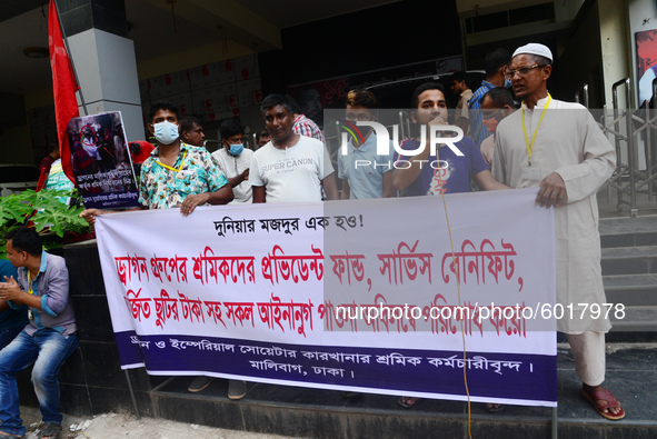 Garments workers of Dragon Group stage a demonstration in front of Department of Labor building demanding their due payment in Dhaka, Bangla...