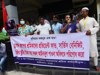 Garments workers of Dragon Group stage a demonstration in front of Department of Labor building demanding their due payment in Dhaka, Bangla...