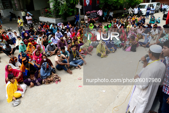 Garments workers of Dragon Group stage a demonstration in front of Department of Labor building demanding their due payment in Dhaka, Bangla...