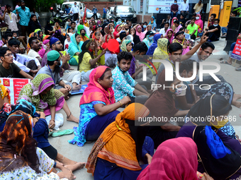 Garments workers of Dragon Group stage a demonstration in front of Department of Labor building demanding their due payment in Dhaka, Bangla...