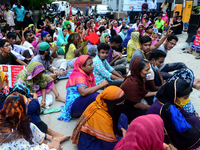 Garments workers of Dragon Group stage a demonstration in front of Department of Labor building demanding their due payment in Dhaka, Bangla...