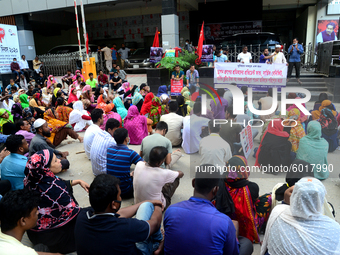 Garments workers of Dragon Group stage a demonstration in front of Department of Labor building demanding their due payment in Dhaka, Bangla...