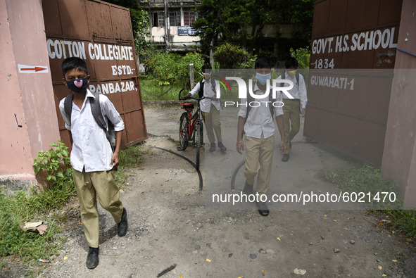 Students coming out from a school after attend school, in Guwahati, Assam, India on September 21, 2020 as schools reopened after more than 5...