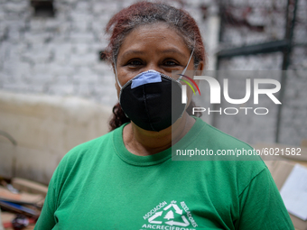 Mrs. America, founder and leader of the Environmental Recovery group for 20 years, in the storage warehouse in the Las Cruces neighborhood,...