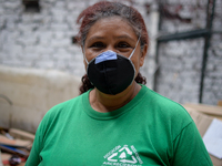 Mrs. America, founder and leader of the Environmental Recovery group for 20 years, in the storage warehouse in the Las Cruces neighborhood,...