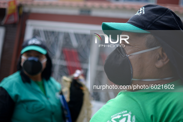 Mr. Botache and Mrs. Stella, during a work day on the recycling route in the town of San Cristóbal, in Bogota, Colombia on September 9, 2020...