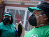 Mr. Botache and Mrs. Stella, during a work day on the recycling route in the town of San Cristóbal, in Bogota, Colombia on September 9, 2020...