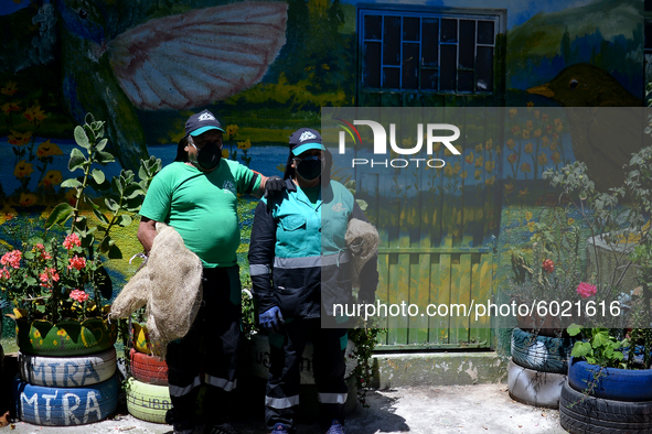 Mr. Botache and Mrs. Stella, during a work day on the recycling route in the town of San Cristóbal, in Bogota, Colombia on September 9, 2020...