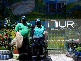 Mr. Botache and Mrs. Stella, during a work day on the recycling route in the town of San Cristóbal, in Bogota, Colombia on September 9, 2020...