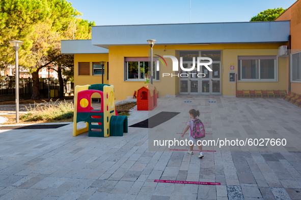 A little girl on her way to school on the first day of school in Molfetta on 24 September 2020.
The return to school for children attending...