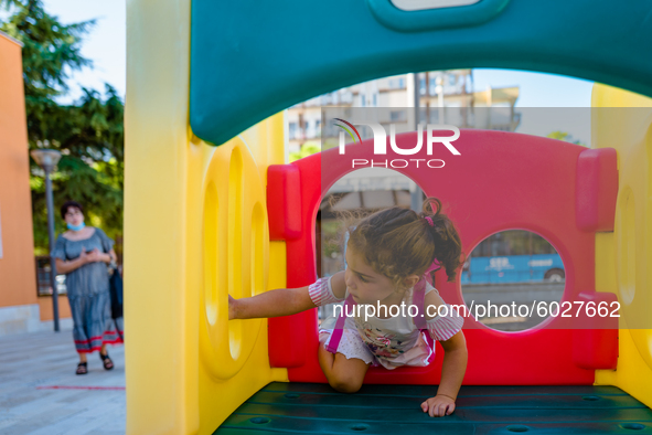 A little girl playing inside the kindergarten on the first day of school in Molfetta on 24 September 2020.
The return to school for childre...