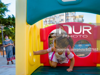 A little girl playing inside the kindergarten on the first day of school in Molfetta on 24 September 2020.
The return to school for childre...