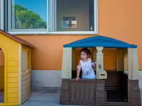 A little girl playing inside the kindergarten on the first day of school in Molfetta on 24 September 2020.
The return to school for childre...