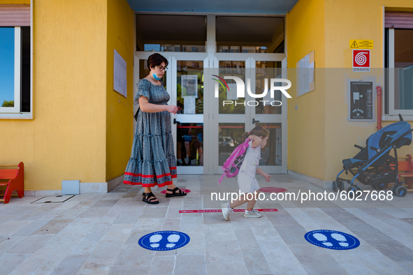 A little girl on her way to school on the first day of school in Molfetta on 24 September 2020.
The return to school for children attending...