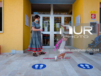 A little girl on her way to school on the first day of school in Molfetta on 24 September 2020.
The return to school for children attending...