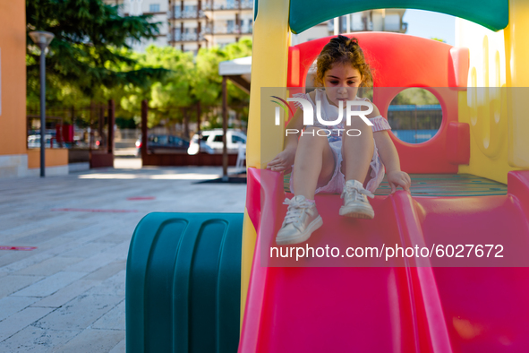 A little girl playing inside the kindergarten on the first day of school in Molfetta on 24 September 2020.
The return to school for childre...