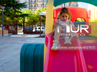 A little girl playing inside the kindergarten on the first day of school in Molfetta on 24 September 2020.
The return to school for childre...