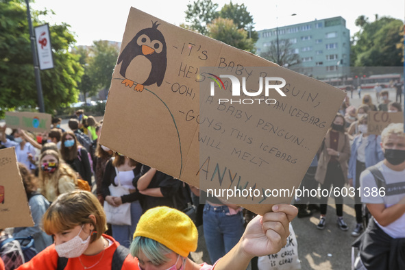 Young protesters with pro-climate banners are seen in Gdansk, Poland, on 25 September 2020  Several hundreds Children and young people weari...