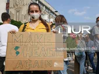 Young protesters with pro-climate banners are seen in Gdansk, Poland, on 25 September 2020  Several hundreds Children and young people weari...